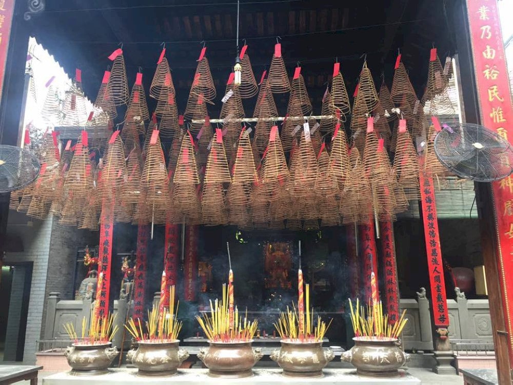 The “Phat Lan” incense burner and gold-lacquered palanquin